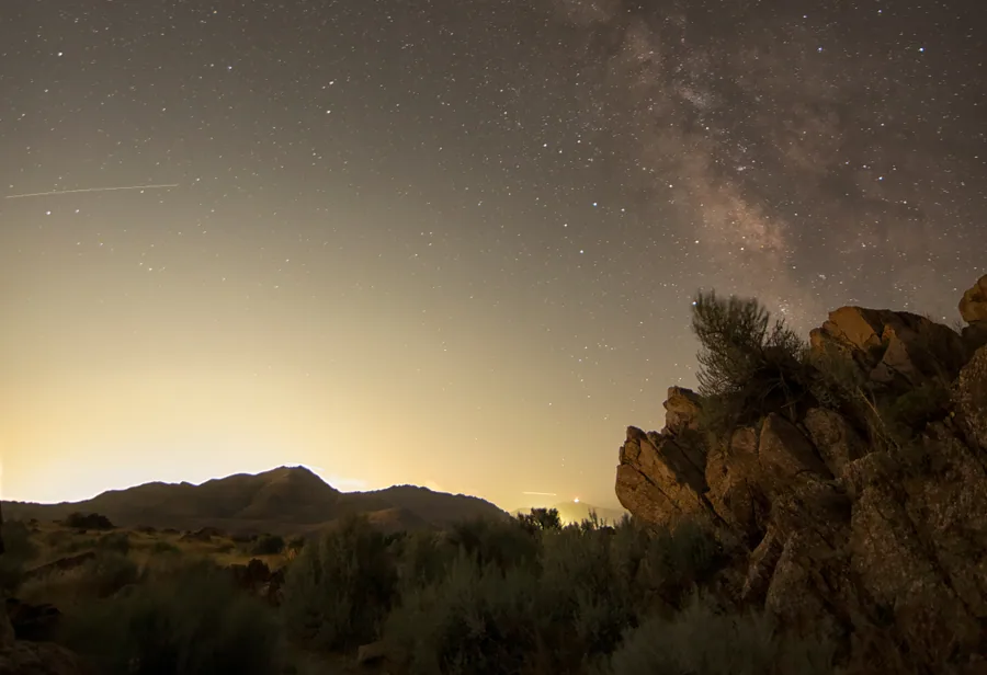 Stars above a rock outcrop on Antelope Island, a certified International Dark Sky Park