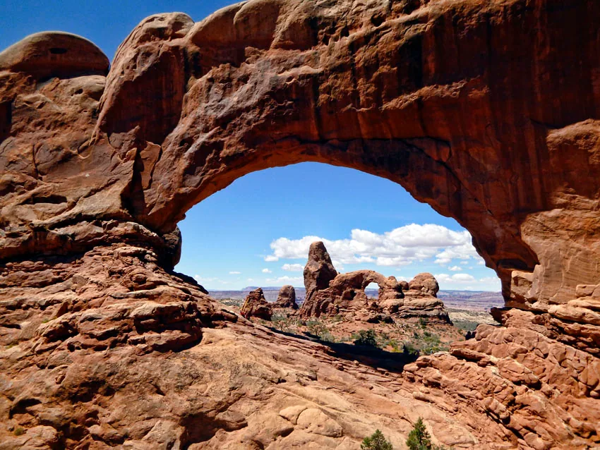 Turret Arch seen through the opening of North Window, one arch framing another, Arches National Park