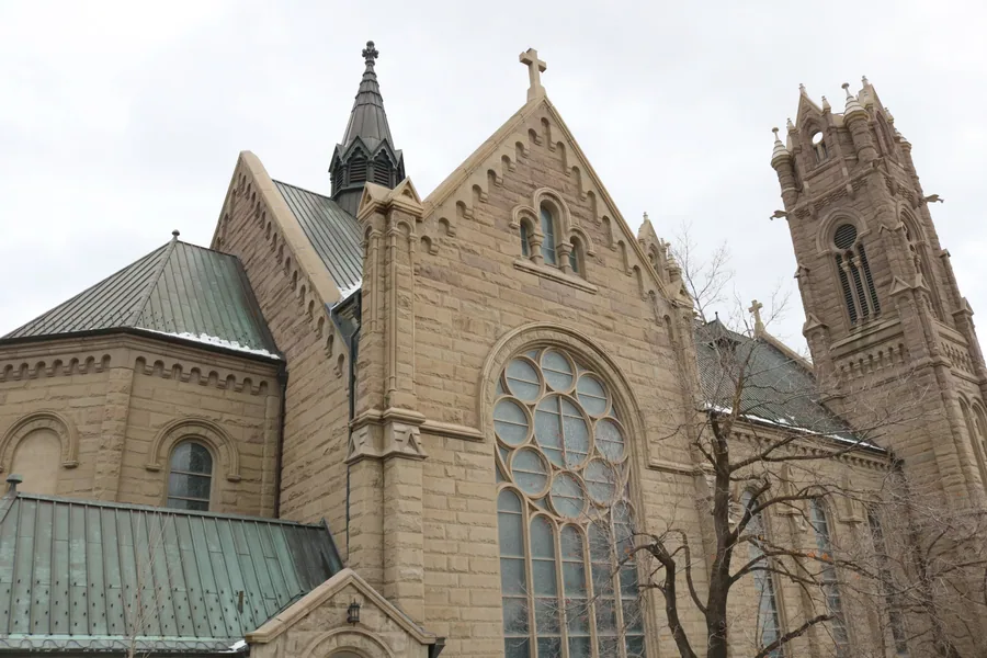 The Romanesque west front and twin towers of the Cathedral of the Madeleine on South Temple.