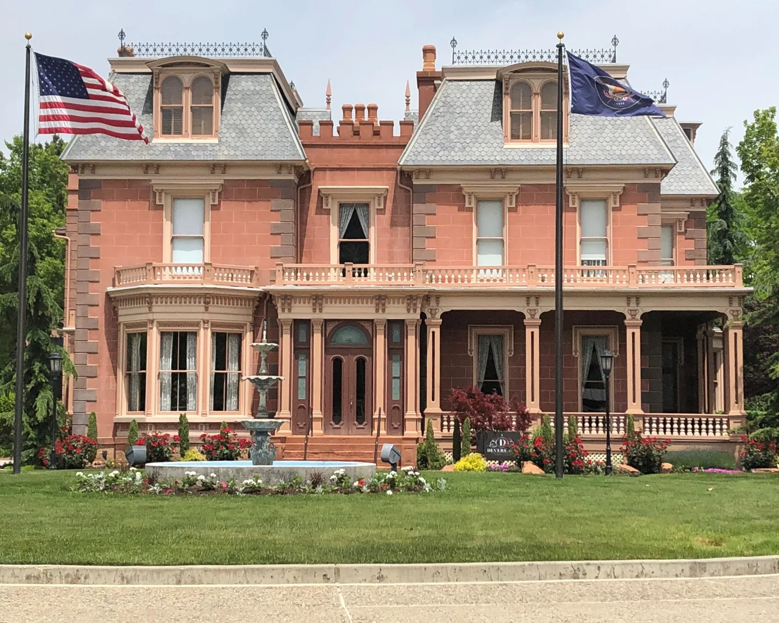 The Devereaux House downtown, the kind of building the drive between the stops takes in.