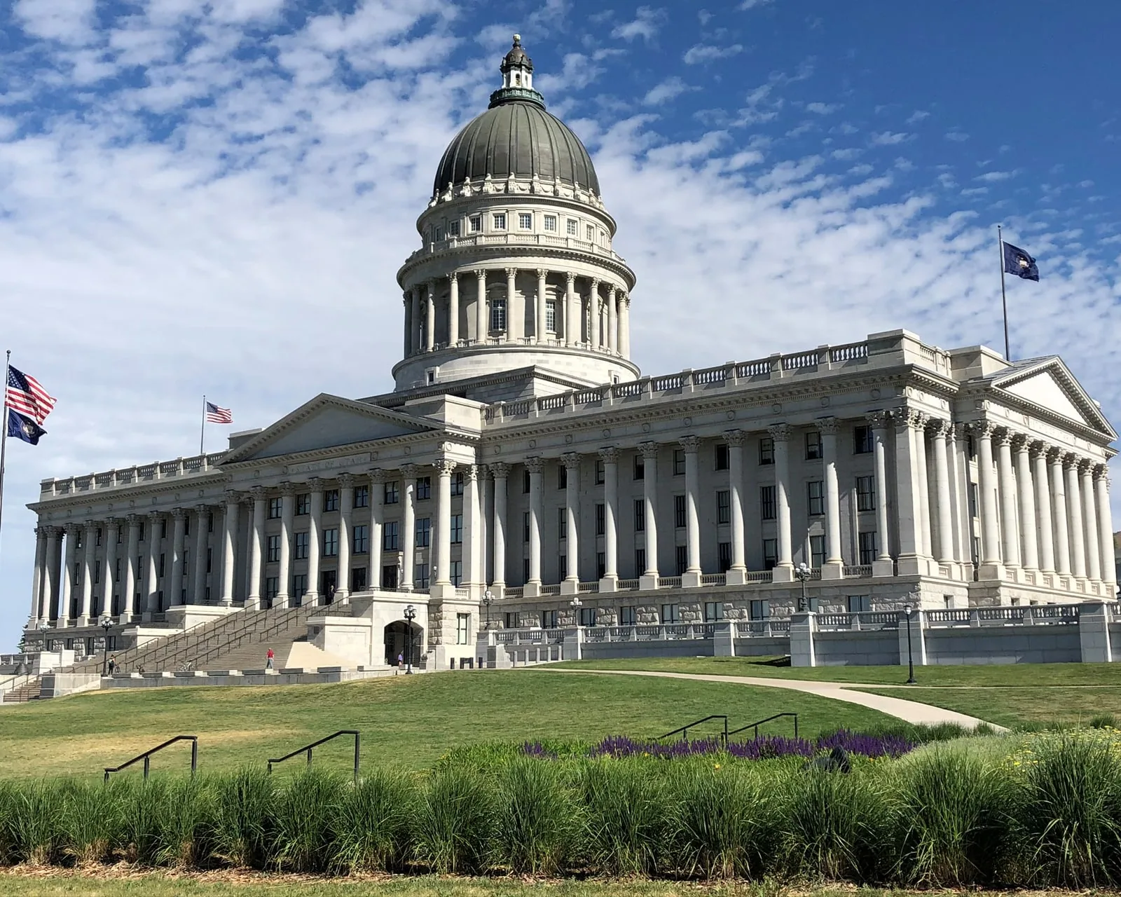 The Utah State Capitol on the bench above the city, a 1916 Renaissance Revival building with a copper dome.