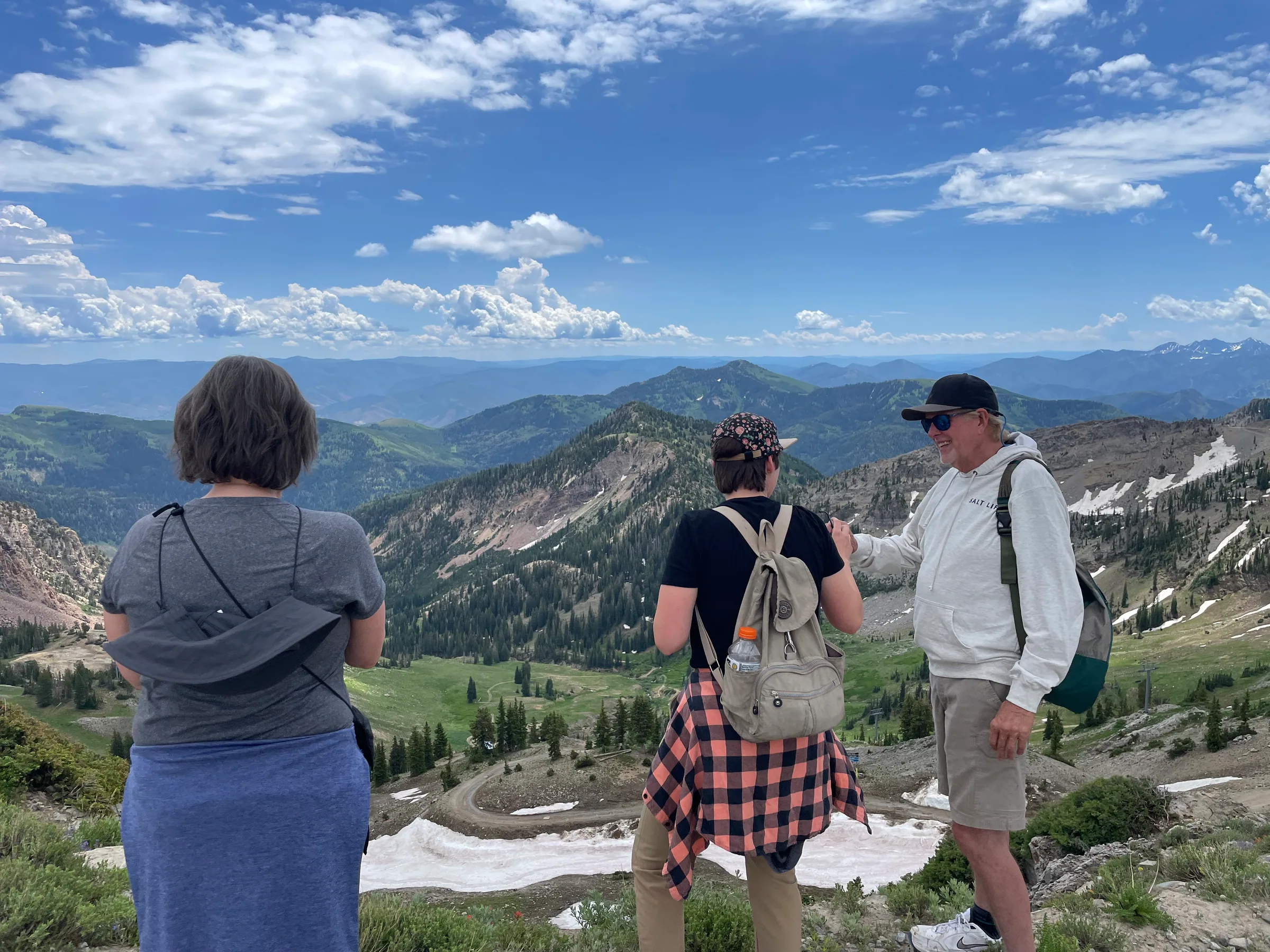 Guests taking in the view from Hidden Peak at the top of the Snowbird tram, Little Cottonwood Canyon