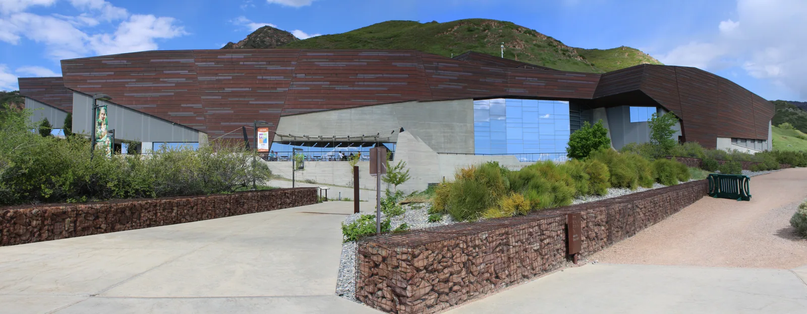 The Natural History Museum of Utah, its copper-clad walls set into the hillside below the Wasatch foothills.